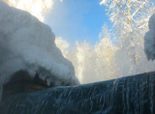 Hot Springs Guide - Liard Hot Springs Waterfall - Photo by Qyd
